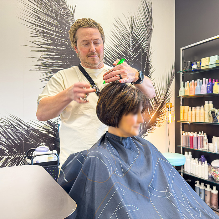 Christian Jones working at Iconic Salon Studios